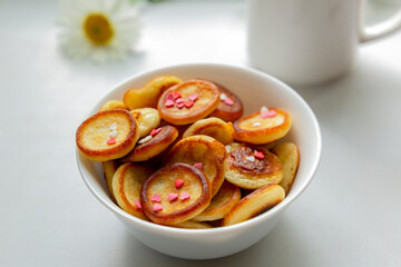 Breakfast with mini pancakes.Trendy food