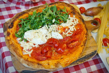 Patriotic Italian tricolore pizza with stripes of red, white and green in the colours of the national flag