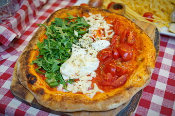 Patriotic Italian tricolore pizza with stripes of red, white and green in the colours of the national flag