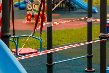 Children's Playground is closed due to pandemic, epidemic. Ban on children's playgrounds. Prevention of covid-19 coronavirus. Fight against virus. Self-isolation mode. Stay at home!