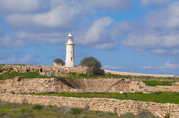 The famous archeological site in Paphos, Amphitheater with lighthouse in the background