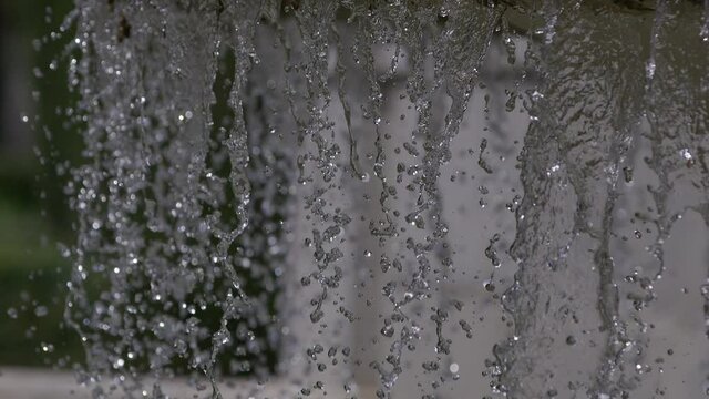 Water fountain in Munich, extreme slow motion 100fps shot on RED Helium 8K with 70-200, super closeup pans down