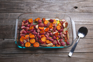 Healthy baked radishes and carrots