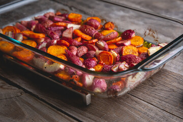 Healthy baked radishes and carrots