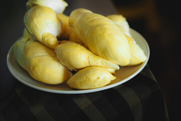 Durian the King of fruits, Durian fruit on   black background ,durian fruit with delicious golden yellow soft flesh