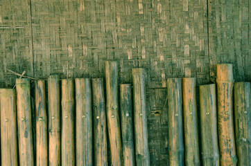 Old woven and trunk bamboo wall