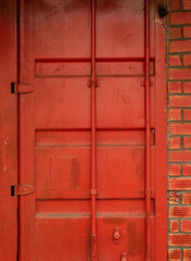 Red metal shipping container doors