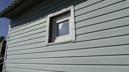 Fototapeta premium window of a two-story residential building