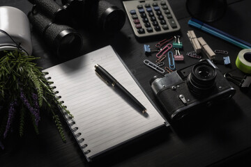 tools for work accessories items on black wooden background, Working desk table concept.