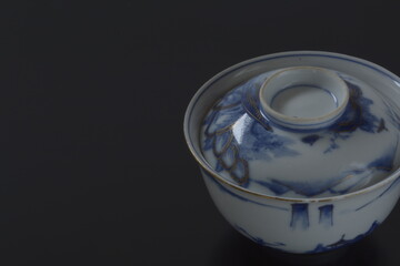 picture rice bowl. This is a very fine example of Japanese traditional antique “ imari ware ”. black background with copy space.