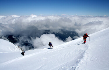 Fototapeta na wymiar Mountaineer climbing Mont Blanc at Gouter Route in French Alps, France.