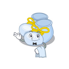 Obraz premium A cartoon picture of baby boy boots waiter with a white napkin