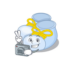 a professional photographer baby boy boots cartoon picture working with camera