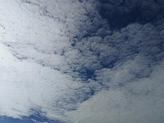 Flat clouds as white sheet of paper or cotton in the sky