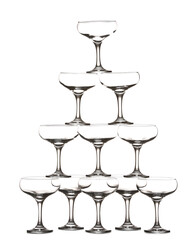 Tower made of empty glasses on white background