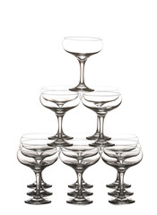 Tower made of empty glasses on white background