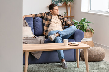 Fototapeta premium Lazy man spending day off at home