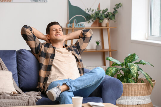 Lazy man spending day off at home