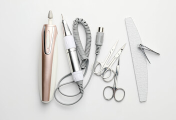 Supplies for manicure on white background
