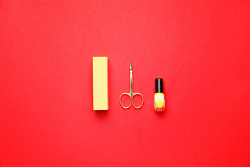 Supplies for manicure on color background