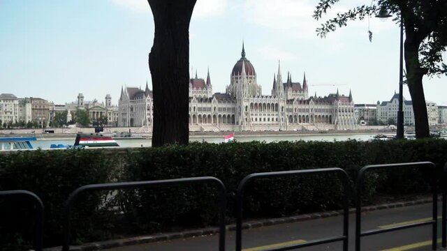 Looking out over the Danube River at the Hungarian Parliament building from a moving public tram