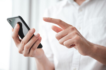 Man using smart phone for communication