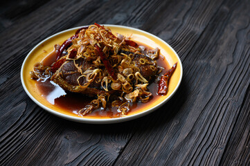 Fried fish with lemon grass, sweet sauce