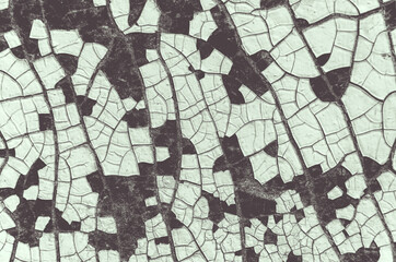 Old cracked white paint wooden textured background.