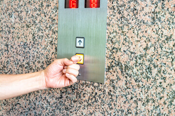 Press the elevator button.
