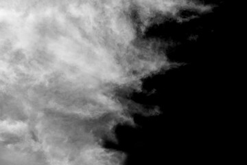 White cloud isolated on black background.