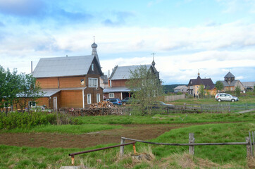 Kola Peninsula, Russia. Old Pomeranian village of Varzuga in cloudy summer day