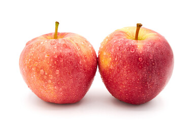 Two red apples isolated on white background . 