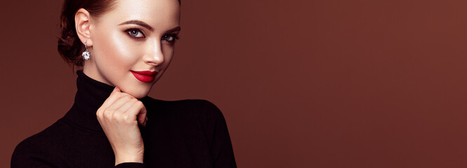 Beautiful Young Woman with Clean Fresh Skin. Perfect Makeup. Beauty Fashion. Red Lips. Cosmetic...