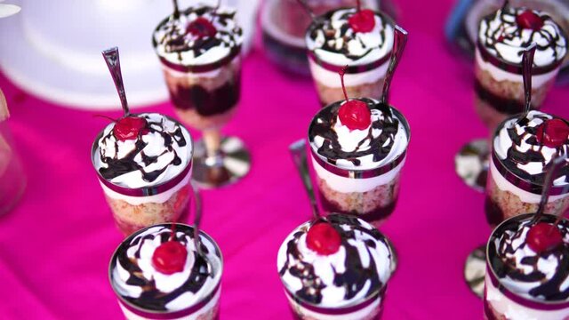 Birthday table with ice cream dessert ready to serve, close up view