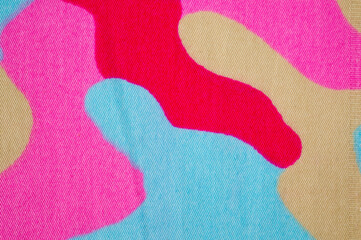 Tight cotton with a bright summer print, photographed close-up.