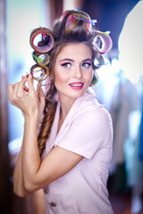 pretty woman with curlers