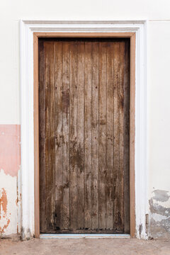 An old closed wooden door