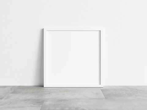 Square empty white frame mock up on concrete floor. Blank frame mock up. 3d illustrations.