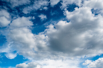 A low angle view of a blue cloudy sky at daytime - perfect for wallpapers and backgrounds