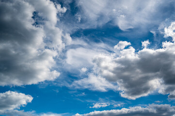 A low angle view of a blue cloudy sky at daytime - perfect for wallpapers and backgrounds