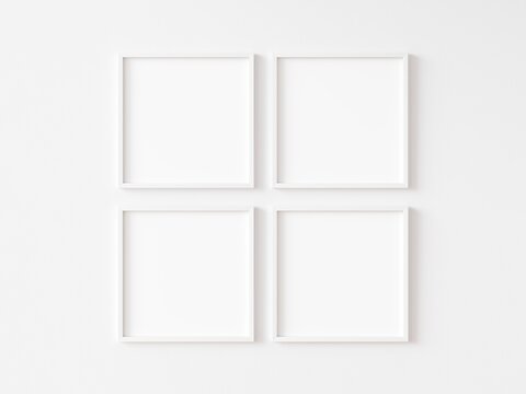 Four square white frame on white wall. 3d illustration.