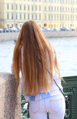 Fototapeta na wymiar The girl with long hair