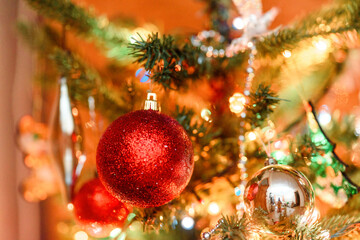 Obraz na płótnie Canvas christmas-tree decoration bauble on decorated Christmas tree
