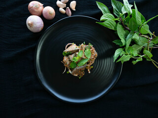 Spicy Pork Liver Salad,Ingredient
Onion,Roasted rice,Basil,Pepper,On a black plate,Thai Street Food