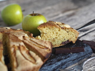 Homemade Apple pie on a rustic wooden background. A classic dessert made of dough for any holiday.