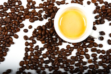 coffee beans and cup of coffee on the table