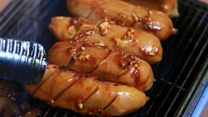Grilling sausages on the stove. 