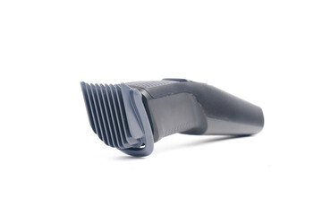 Beard trimmer with 7 mm beard comb on isolated white background. Beard trimmer and hair shaver machine sales increase caused ban on hair salon and barbershop caused by covid-19 pandemic.