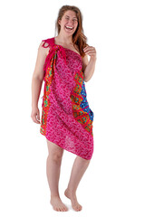 Young woman in red dress stands barefoot against white background