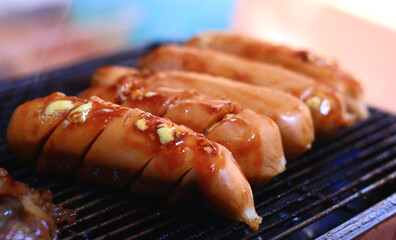 Grilling sausages on the stove. 